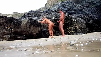 Couple nude on beach