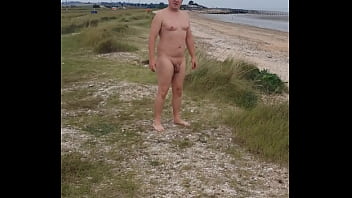 Naturist family on the beach